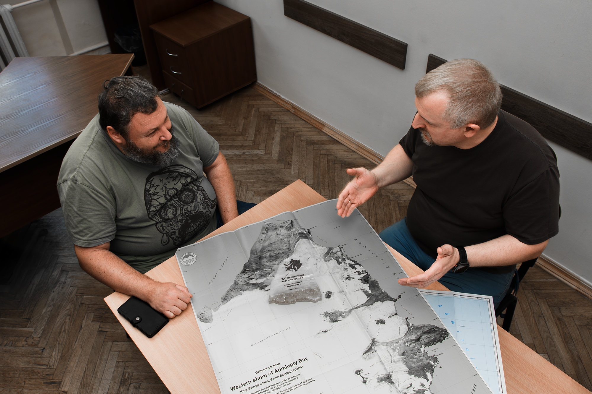 NASC Director Yevhen Dykyi talking with the owner of the PROTECTOR brand